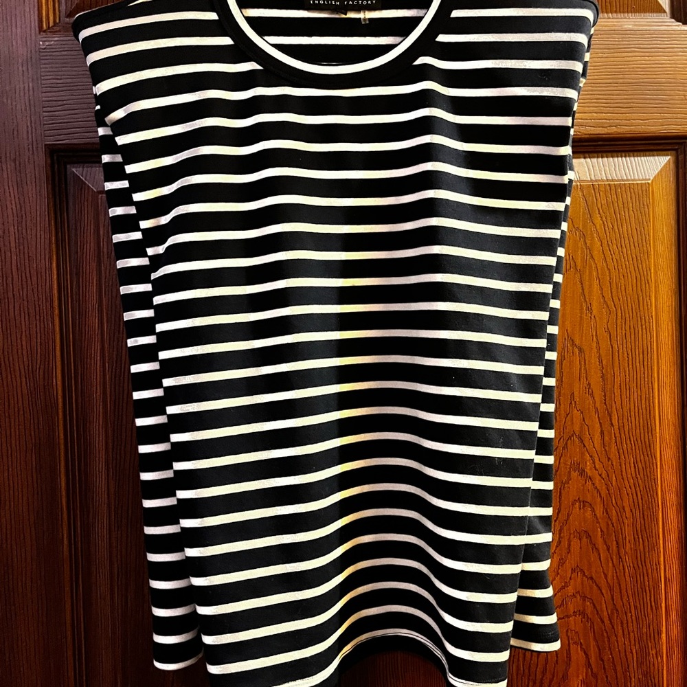 English Factory blue striped shoulder pad top in xs, only worn once.